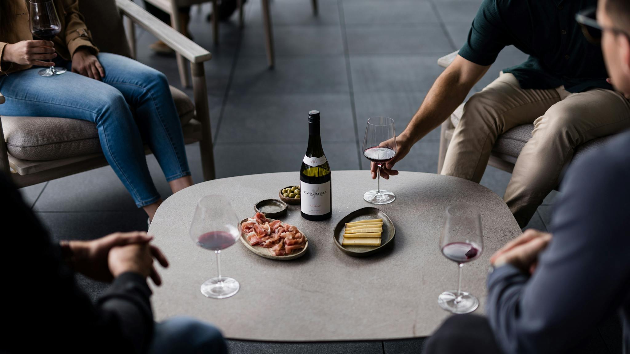 Glass of wine on the balcony at Yangarra Cellar Door