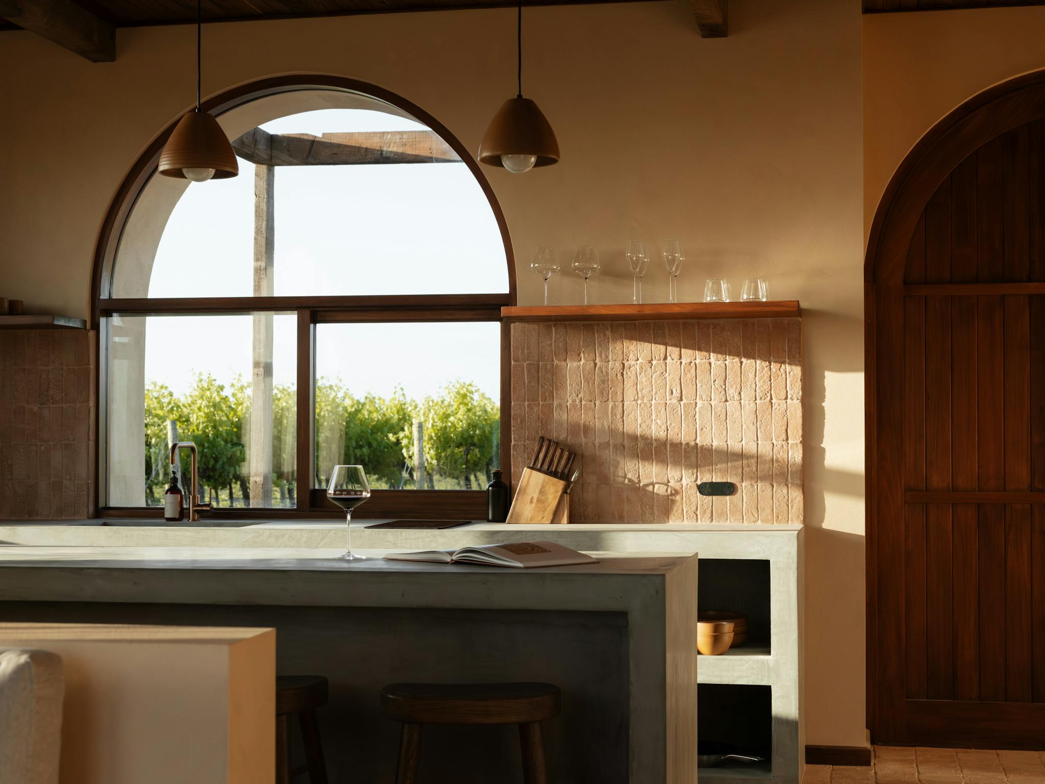 JamFactory pieces are scattered throughout these spaces, including feature pendant lighting.