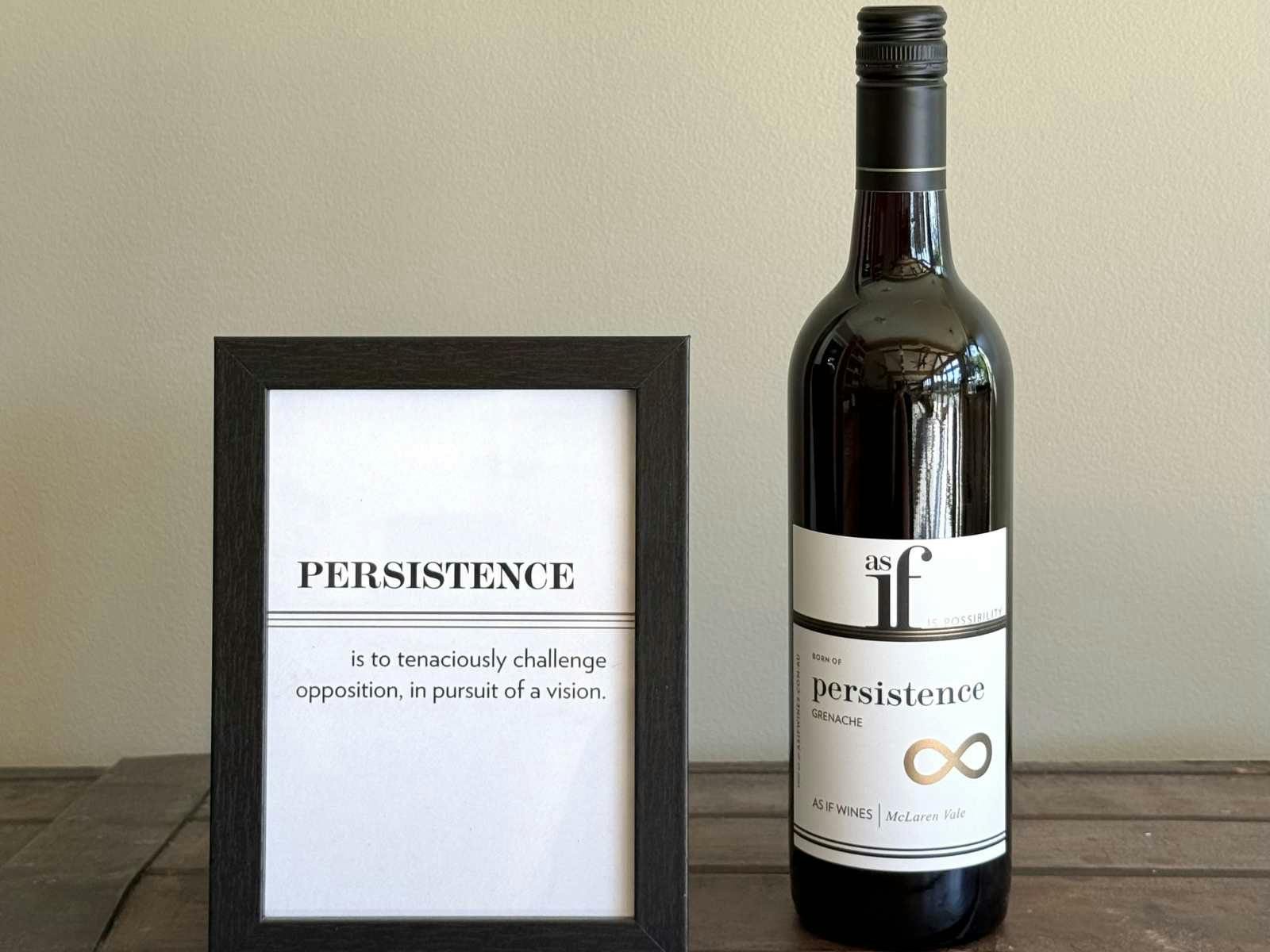 As If 2024 "Persistence" Grenache, picture frame reading "tenacious pursuit of a vision"