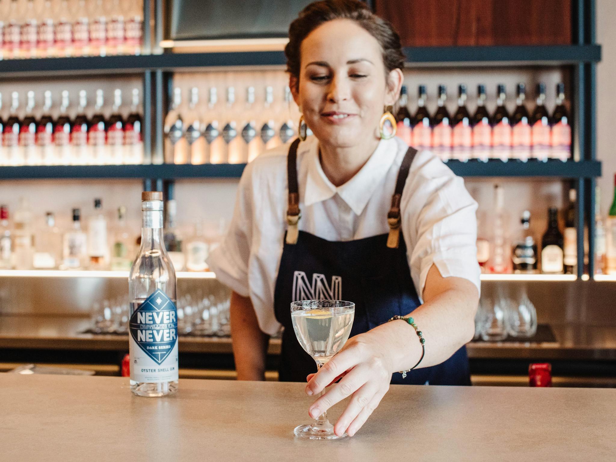 National Brand Ambassador, Shay Chamberlain, serves a perfect Oyster Shell Gin Martini on the bar