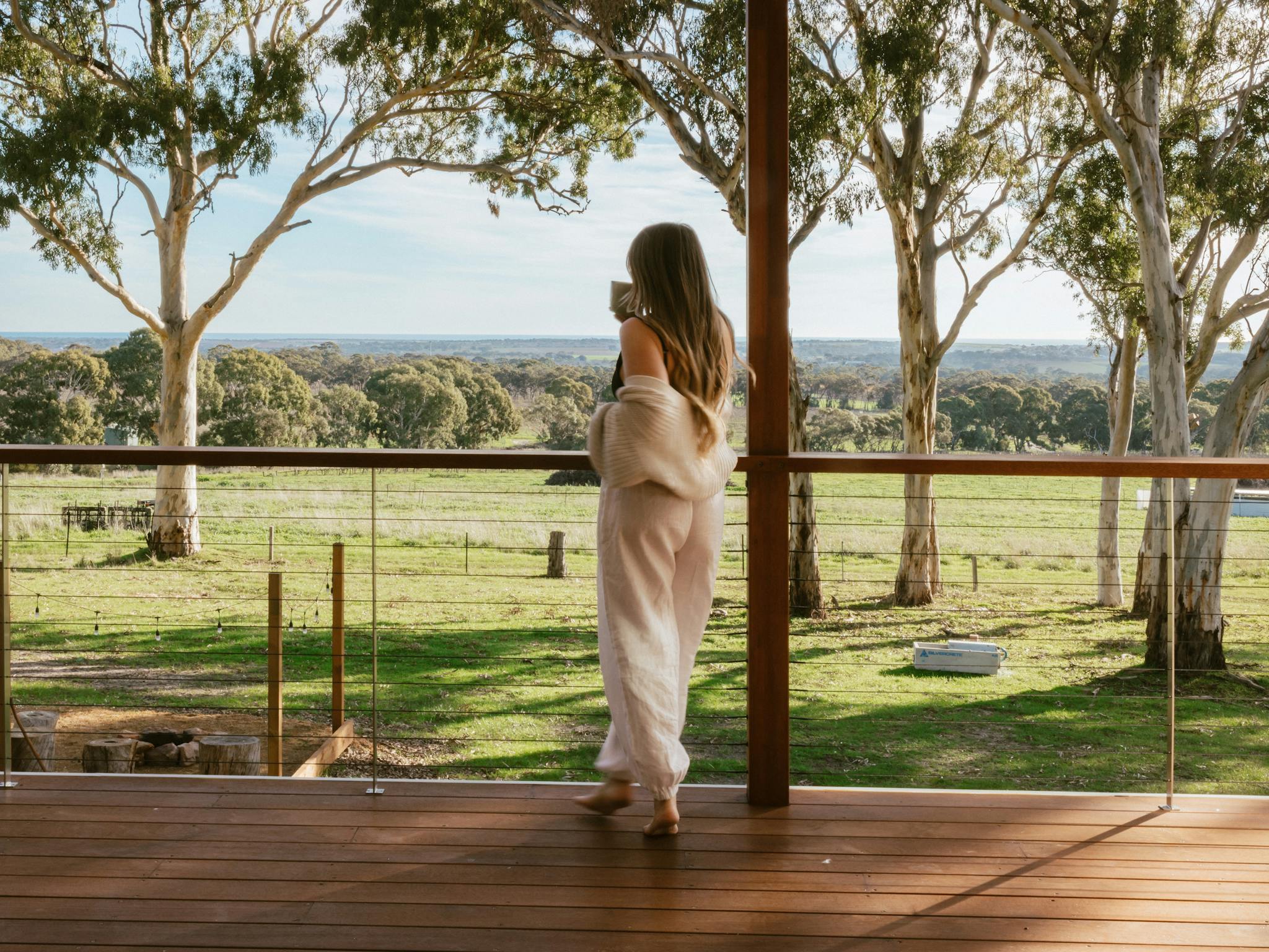 Escape Two Private Balcony views to the coast with breathtaking sunsets and sheep grazing below
