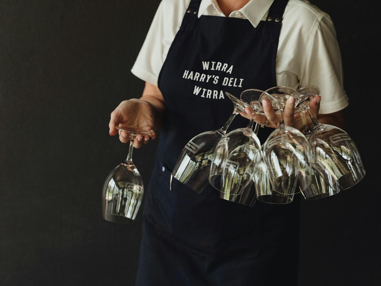 Setting glasses at Harry's Deli, Wirra Wirra