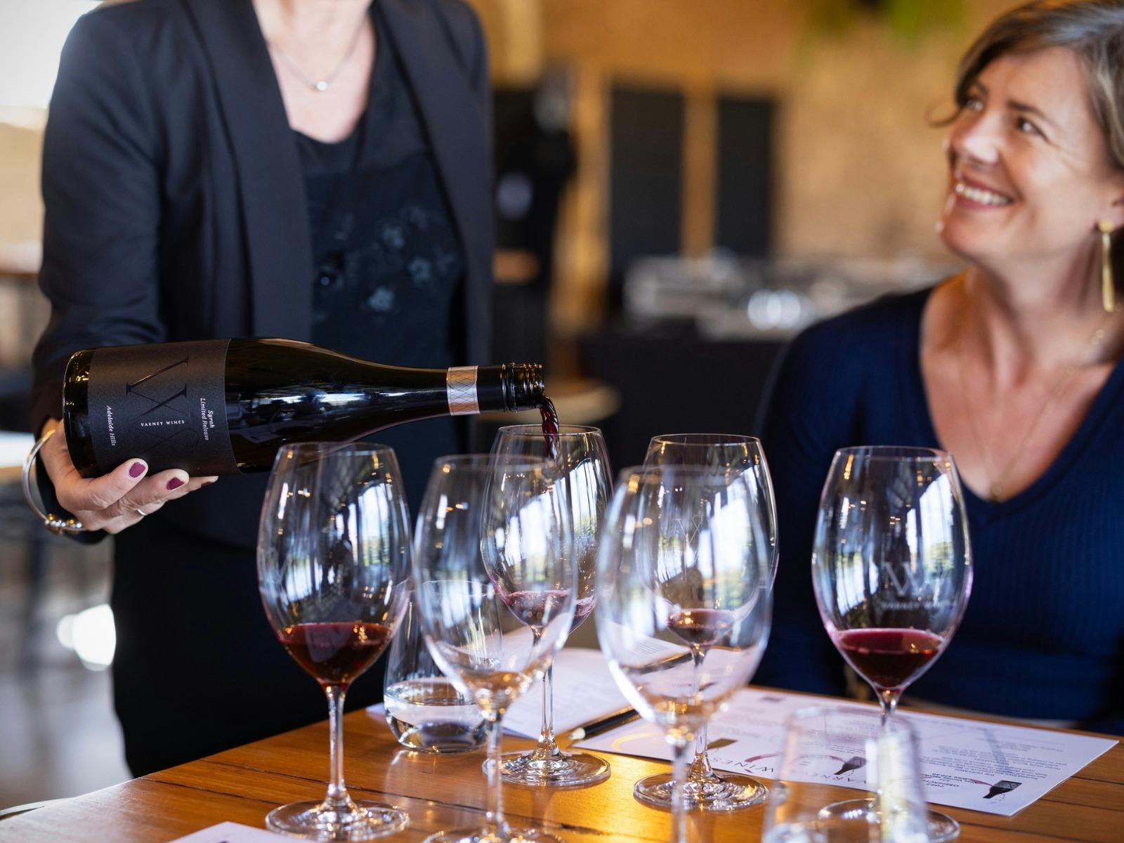 Guests enjoying the wine tasting experience at Varney Wines
