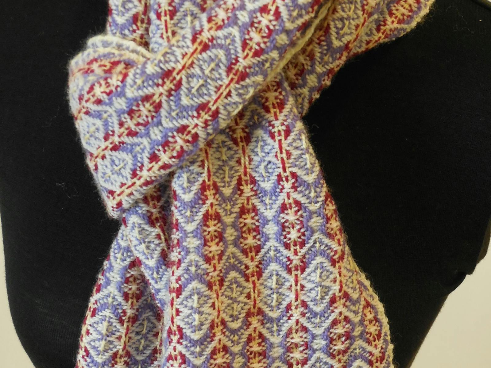 a multicoloured scarf that has been handwoven to suit many of your outfits