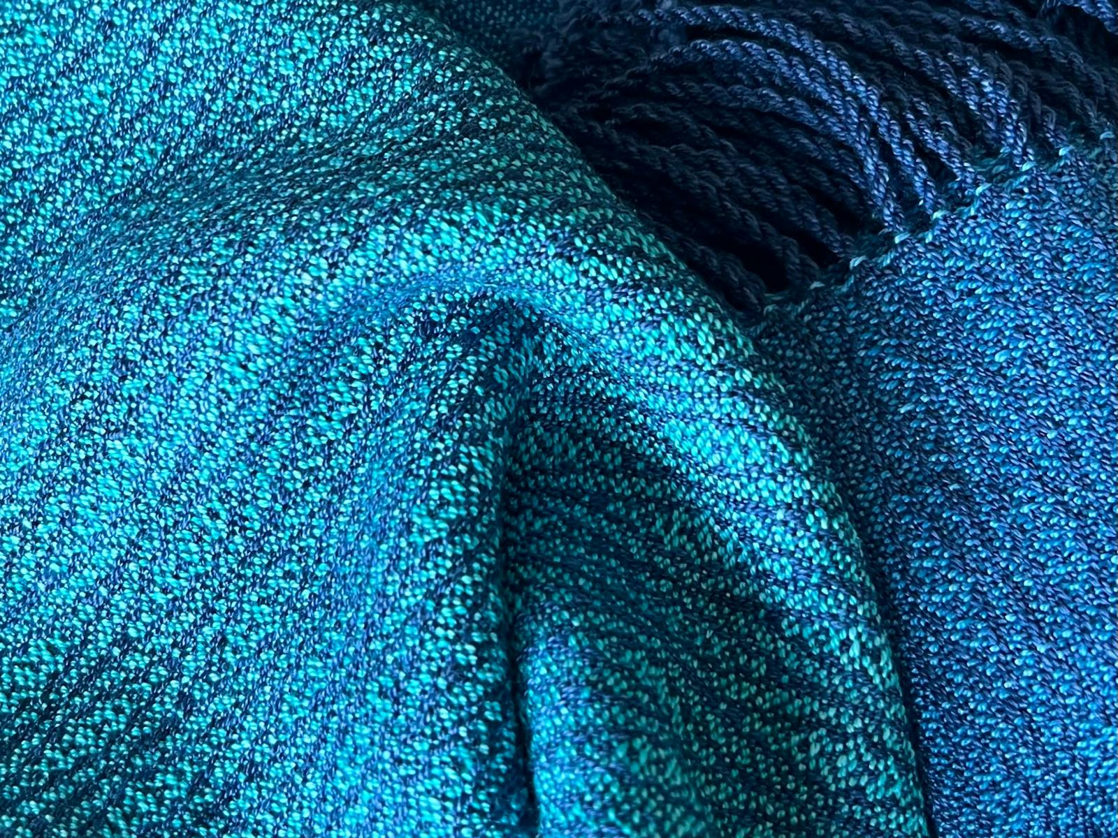 A shimmering shawl that sets of what you are wearing