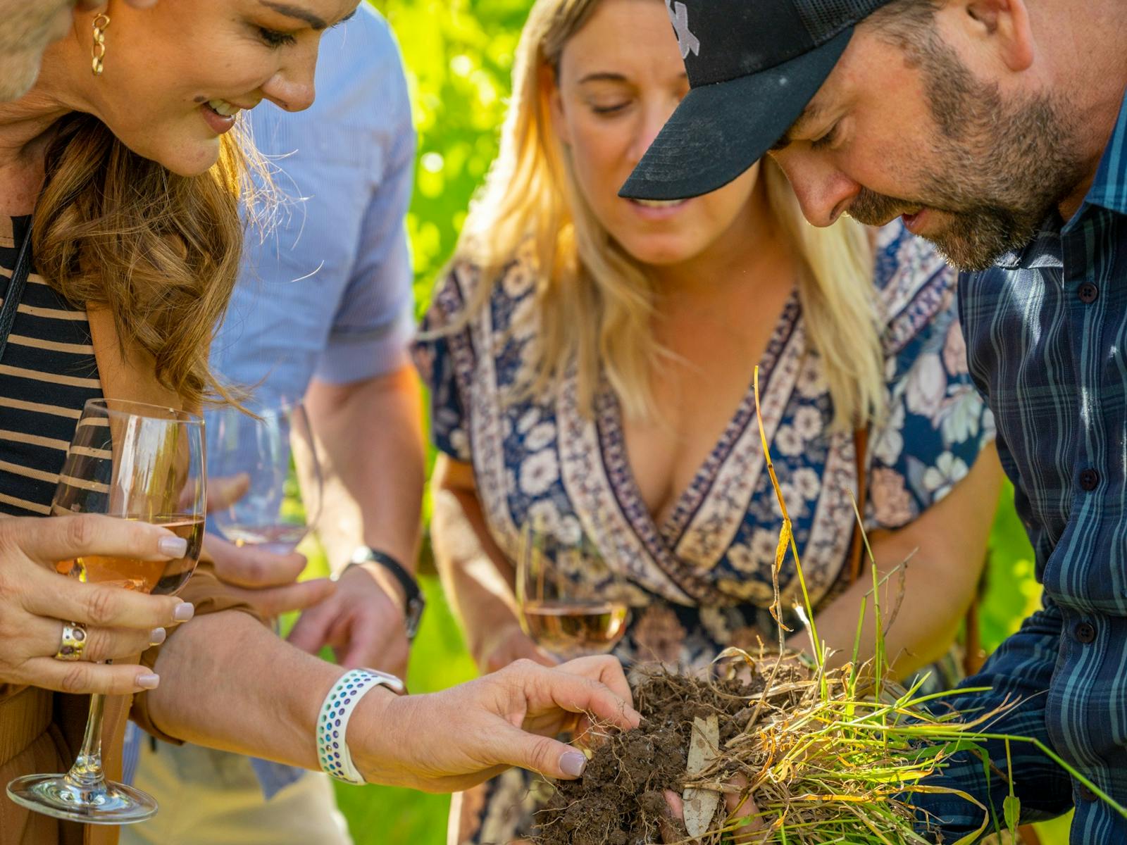 Guests inspecting soil composition
