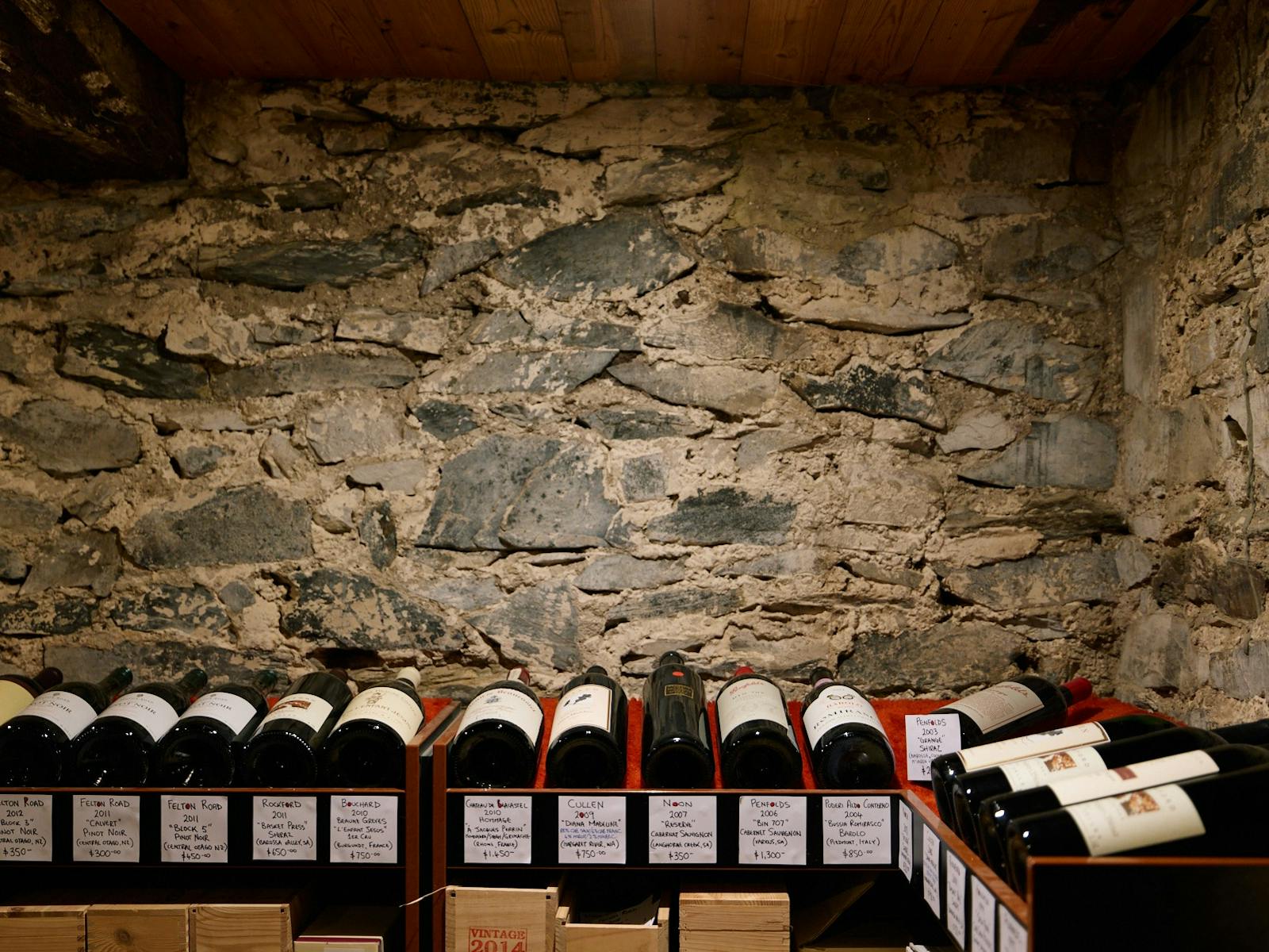 Cellar image with wine bottles