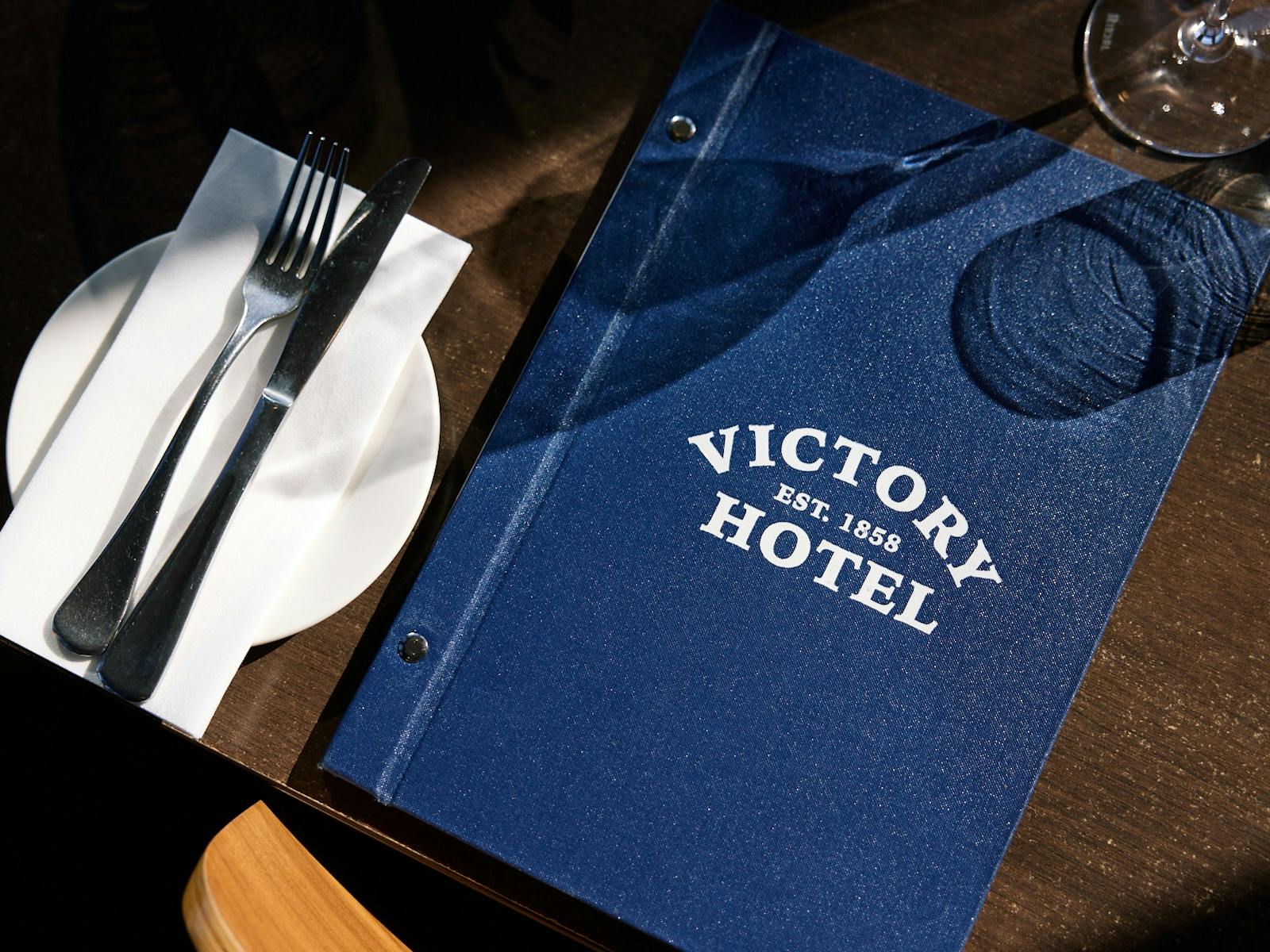 Victory hotel menu on table