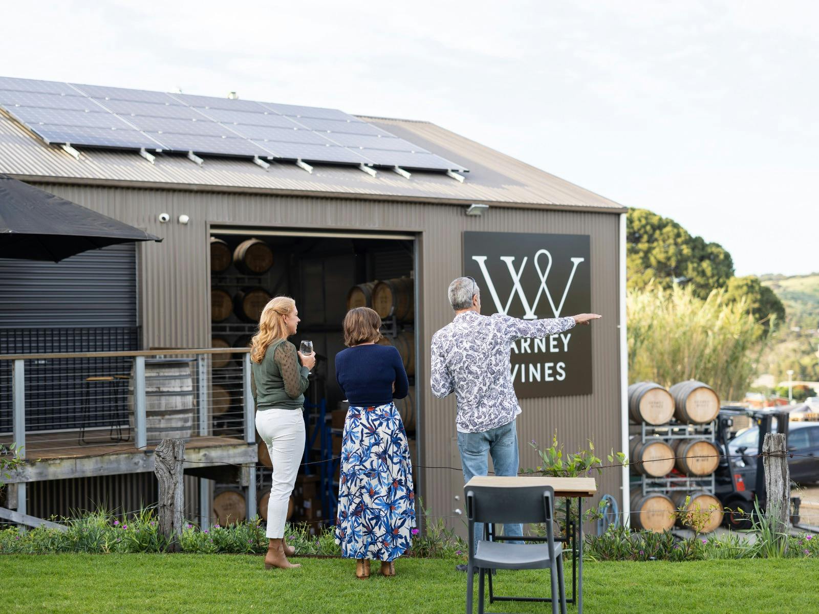 Guests on the lawn overlooking the winery at Varney Wines.