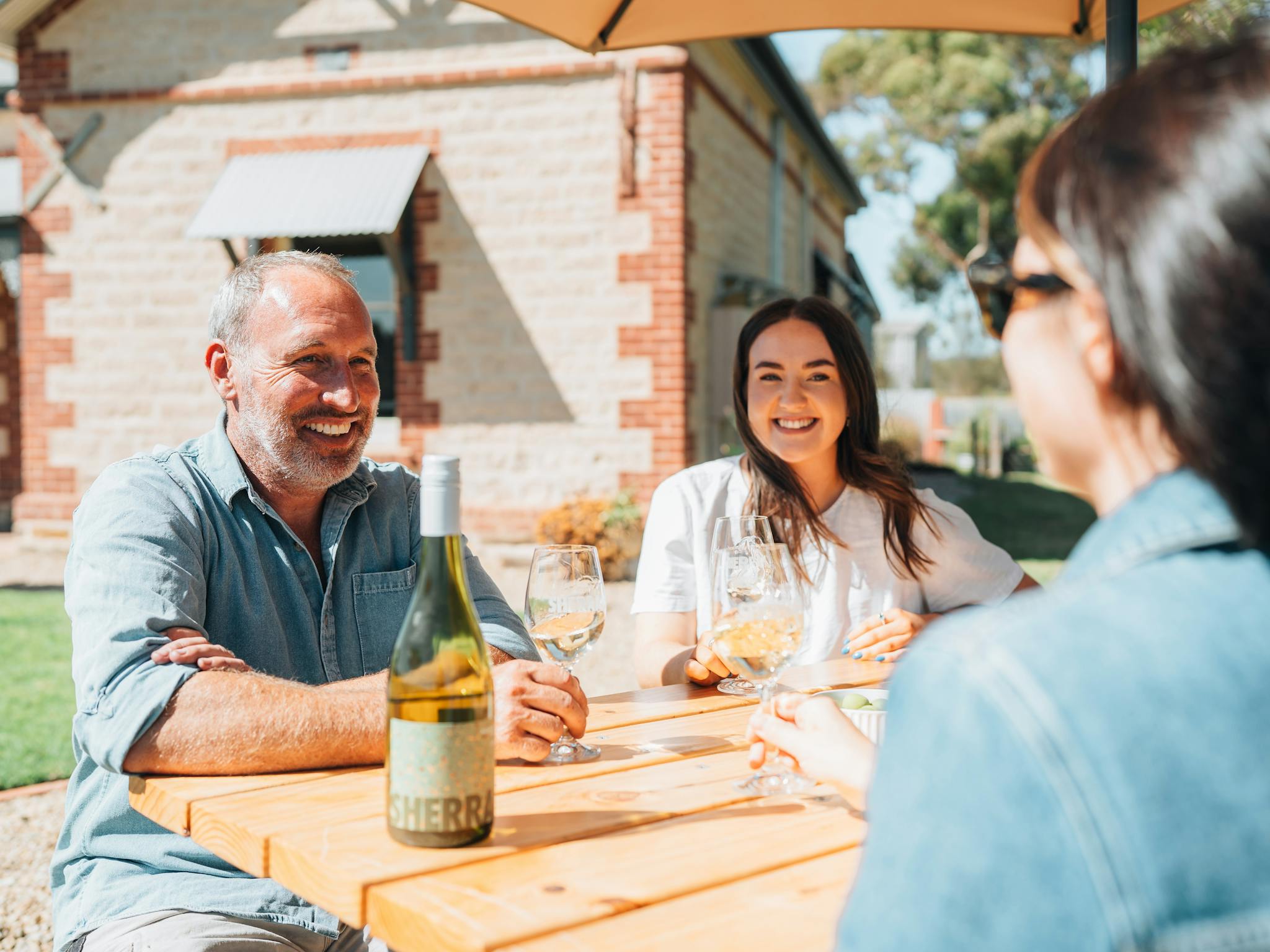 Guests enjoying a tasting oudoors at Sherrah Wines cellar doors