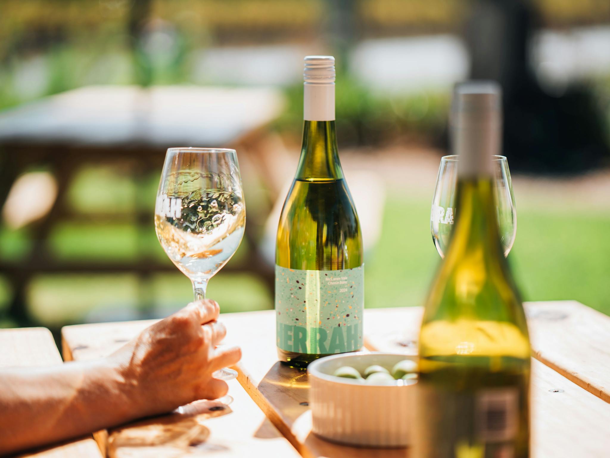 2 bottles and 2 glasses of wine.