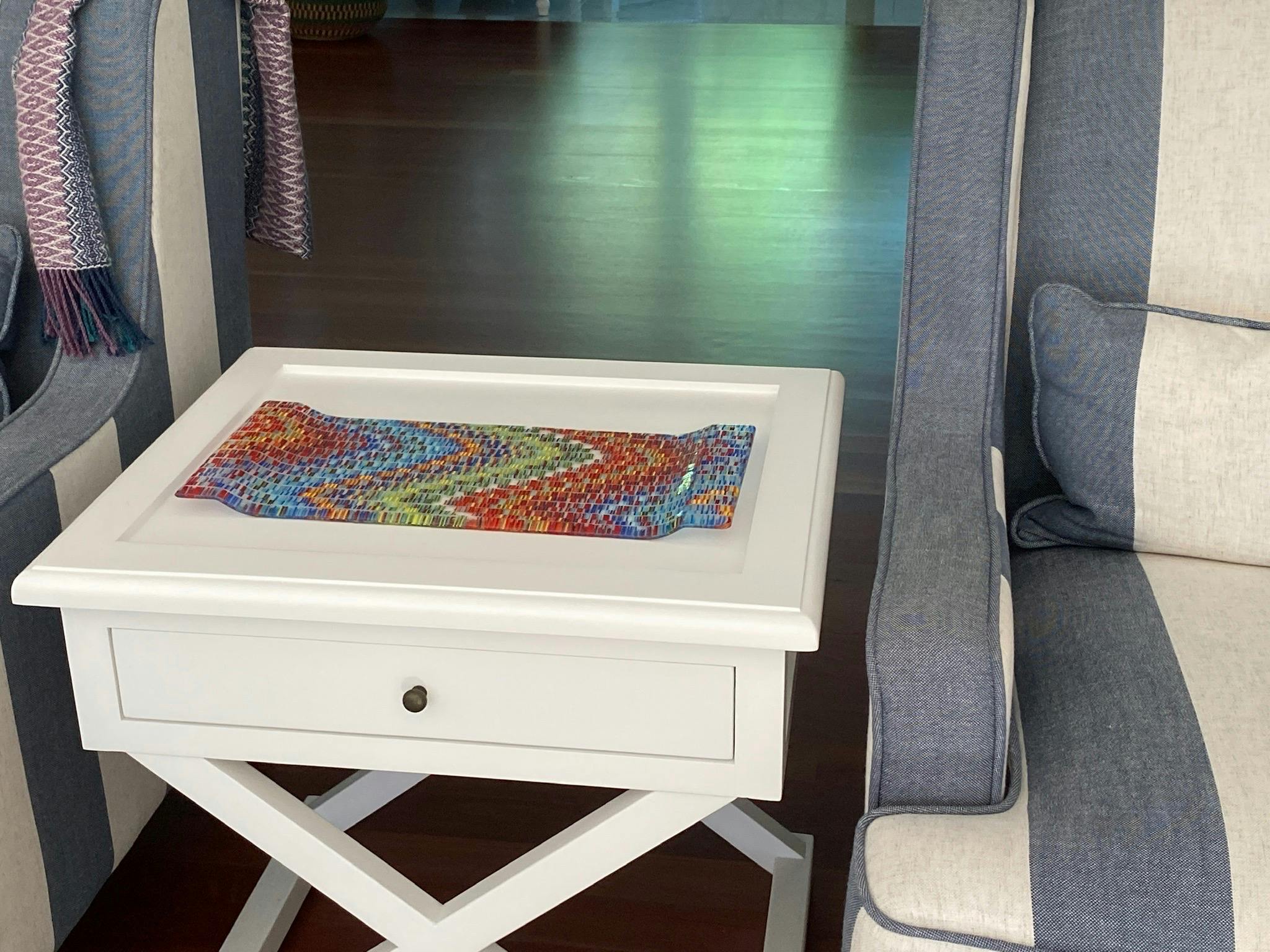 Platters made of numerous small items of glass, fused together
