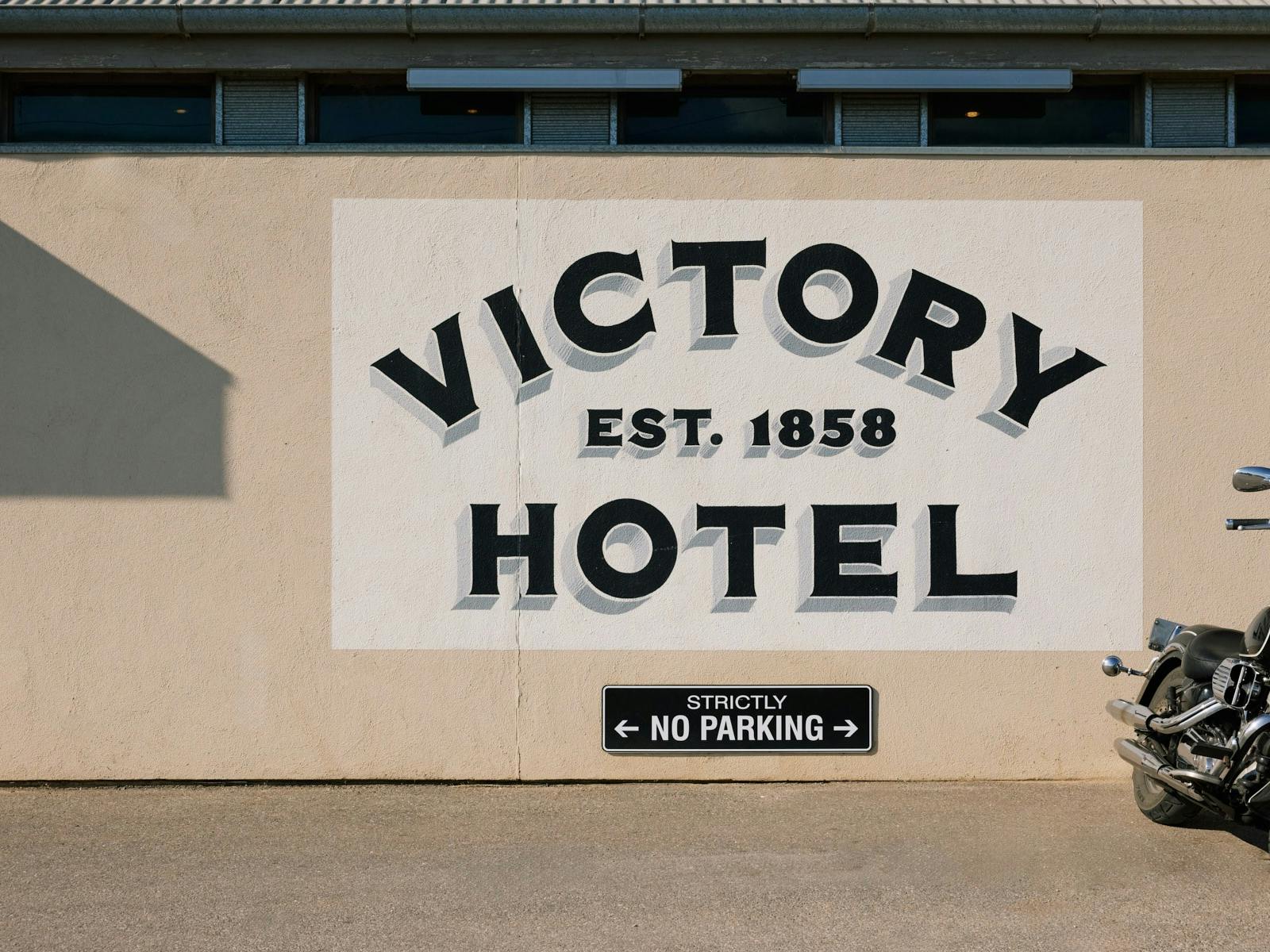 Victory Hotel logo