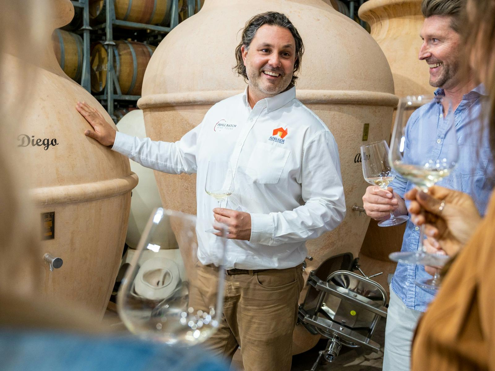 Tasting wine in the barrel room